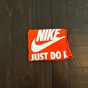 bright orange “the nike tee”